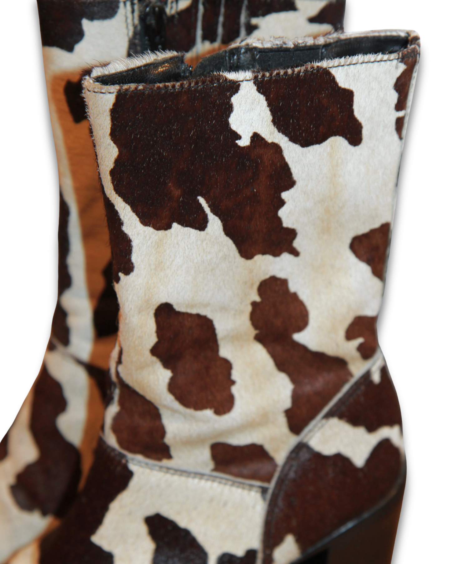 STEVE MADDEN COW PRINT PLATFORM BOOTS
