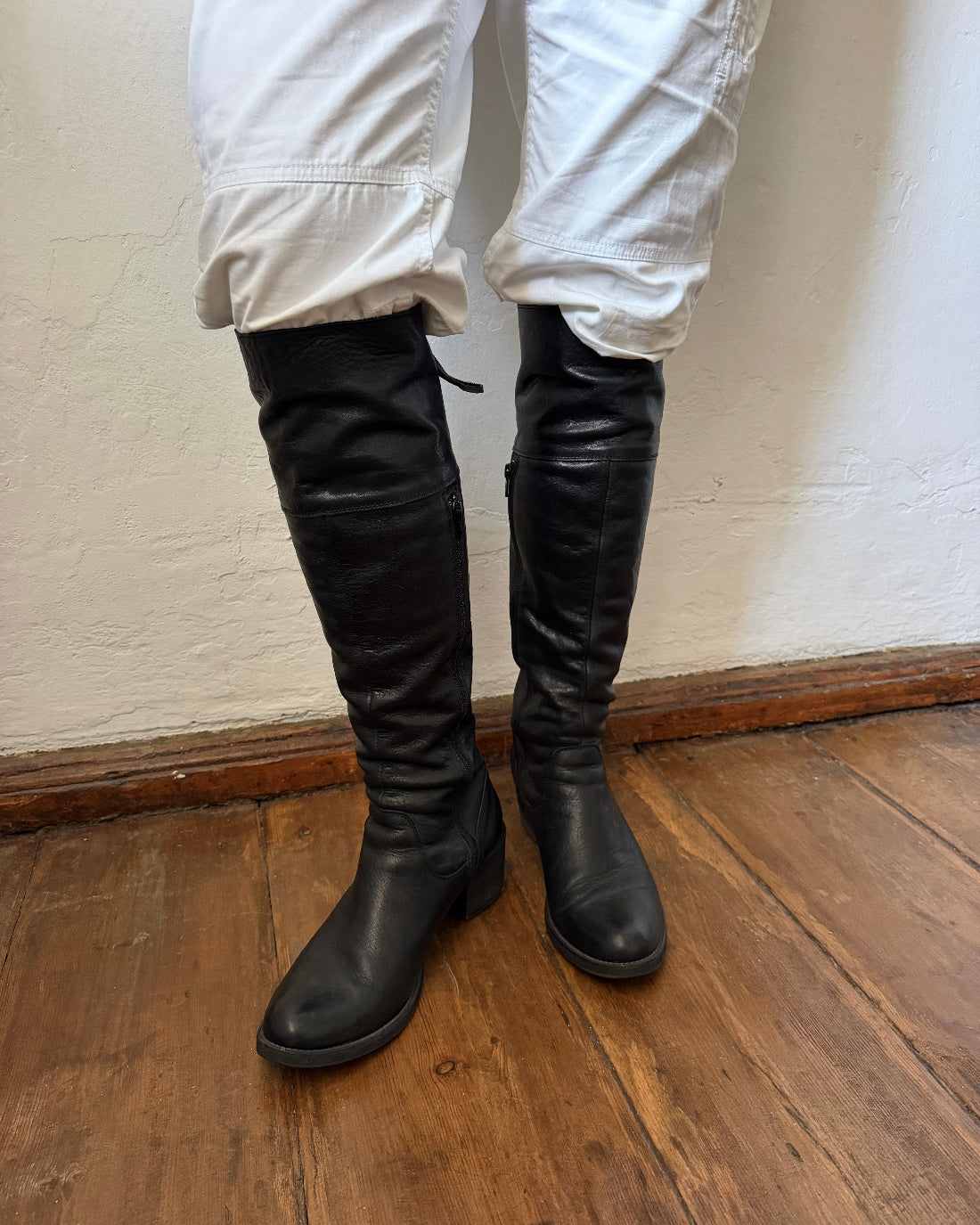 Vintage black leather lace-up boots with rounded toe