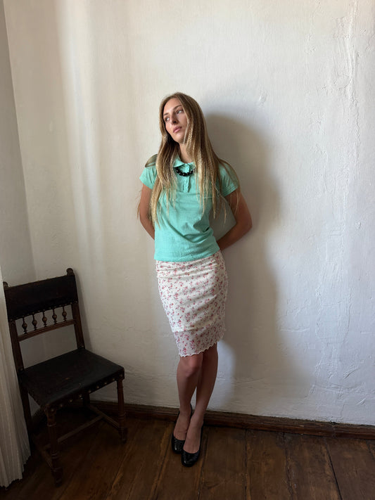 Floral mesh midi skirt with pink ditsy print and lettuce hem