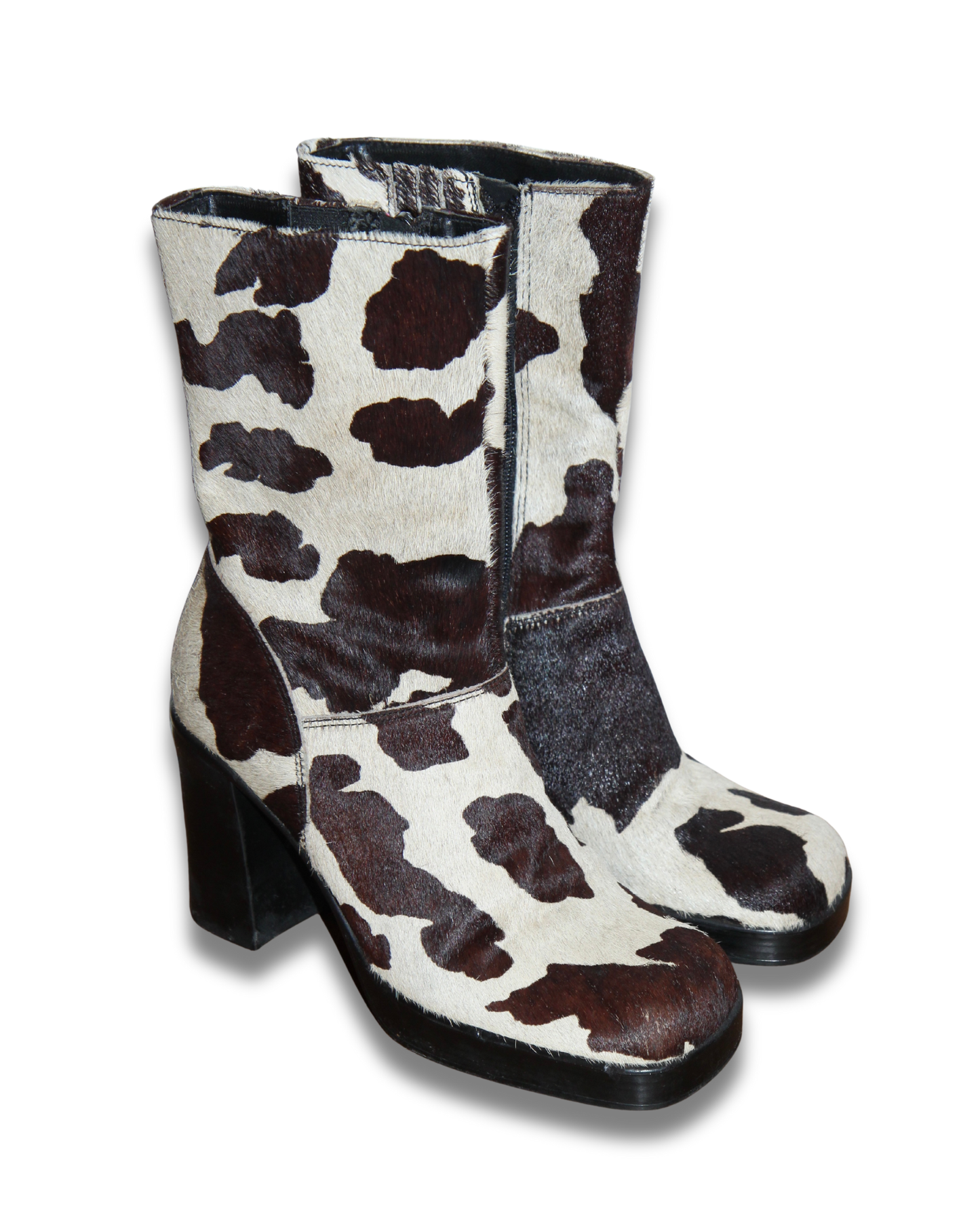 STEVE MADDEN COW PRINT PLATFORM BOOTS