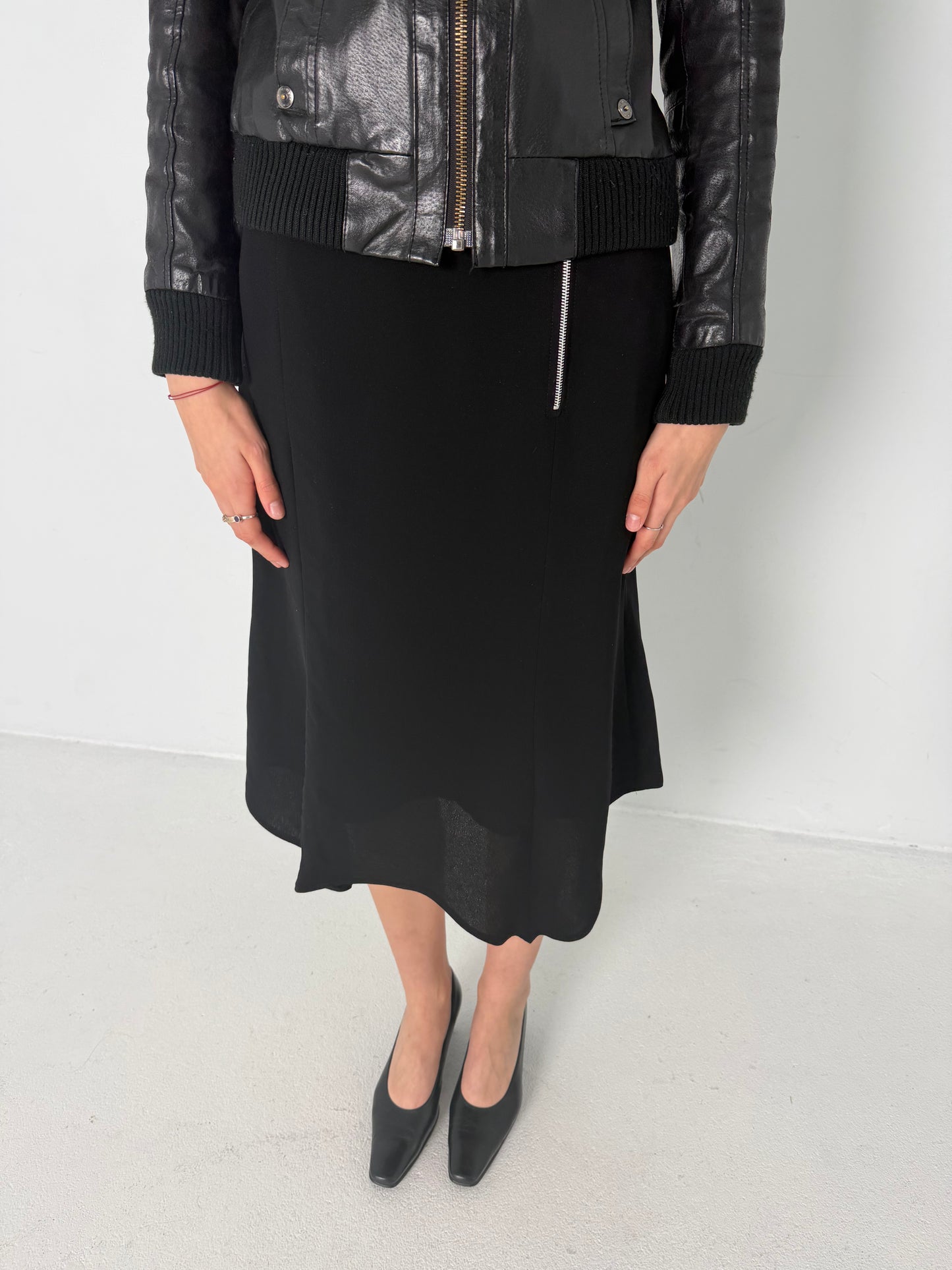 ASYMMETRIC HEM BLACK MIDI SKIRT