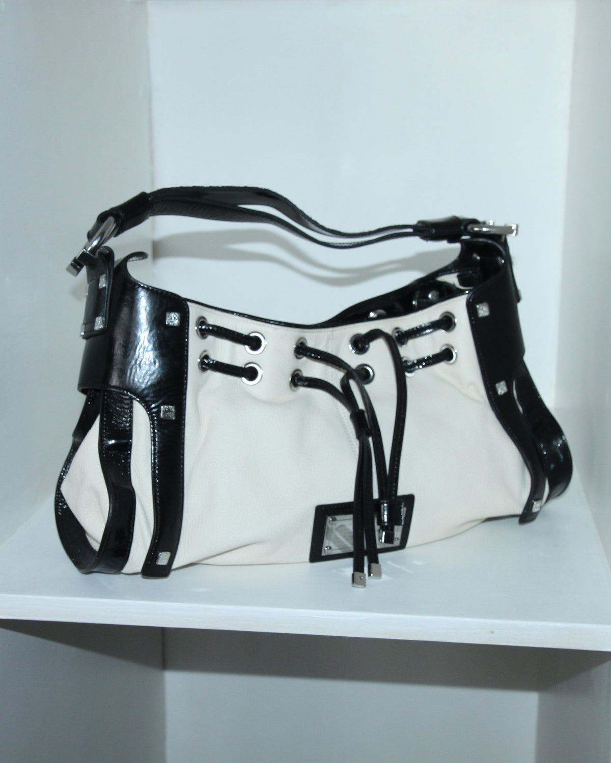 karen miller white black bag
