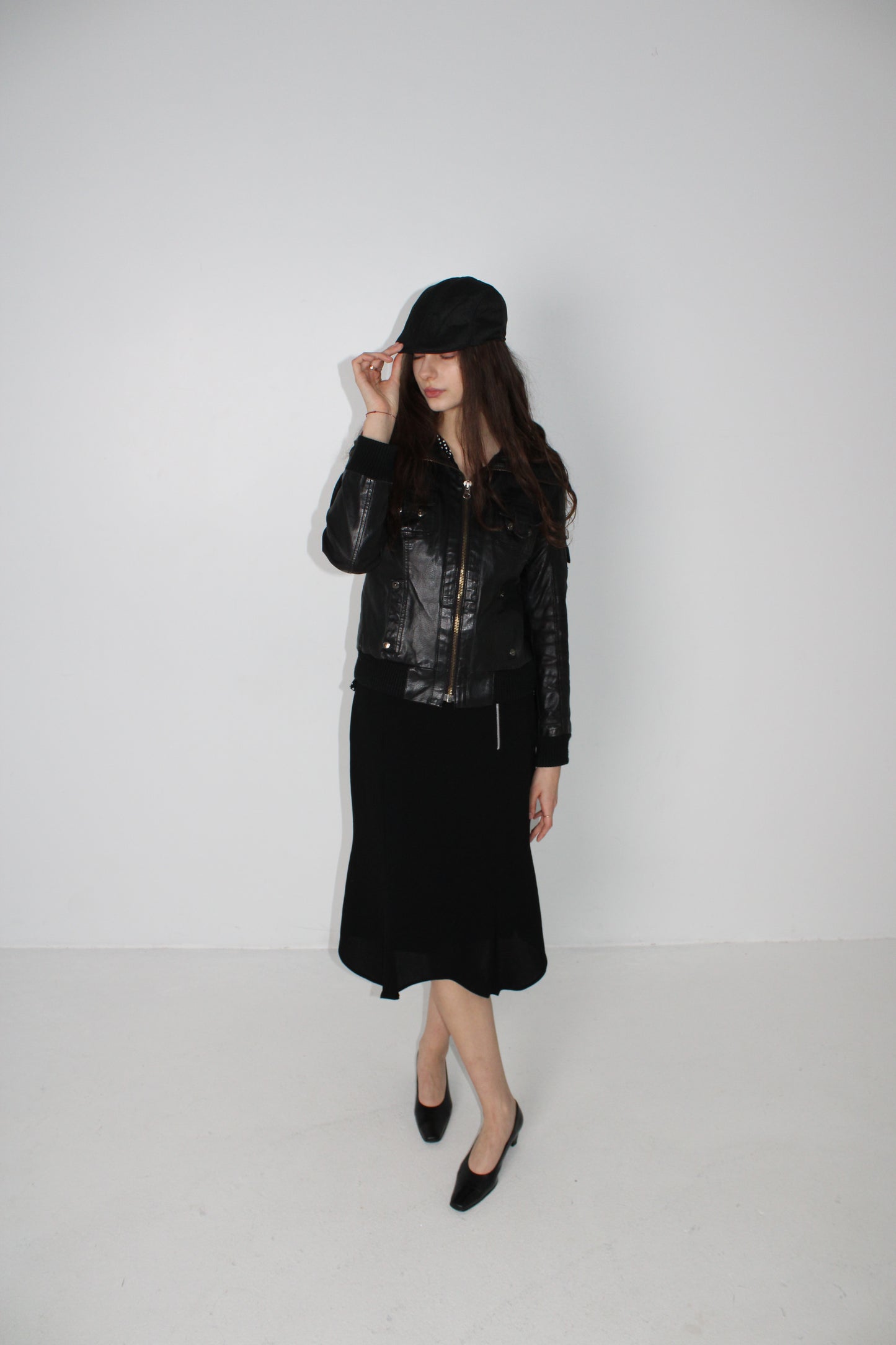 ASYMMETRIC HEM BLACK MIDI SKIRT