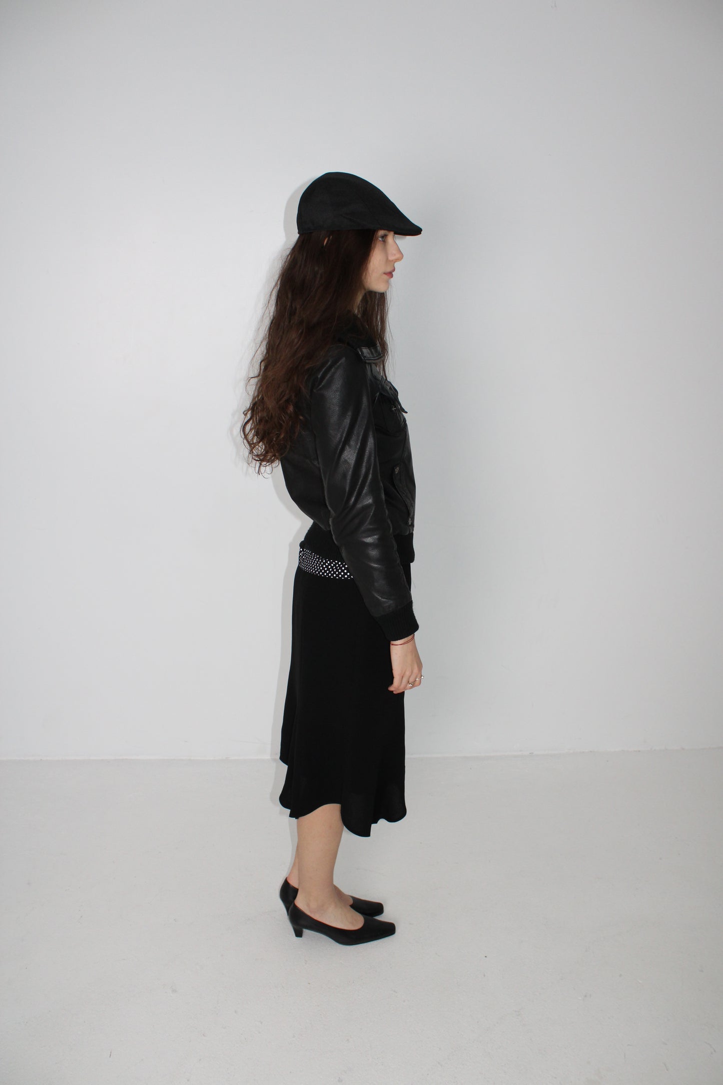 ASYMMETRIC HEM BLACK MIDI SKIRT