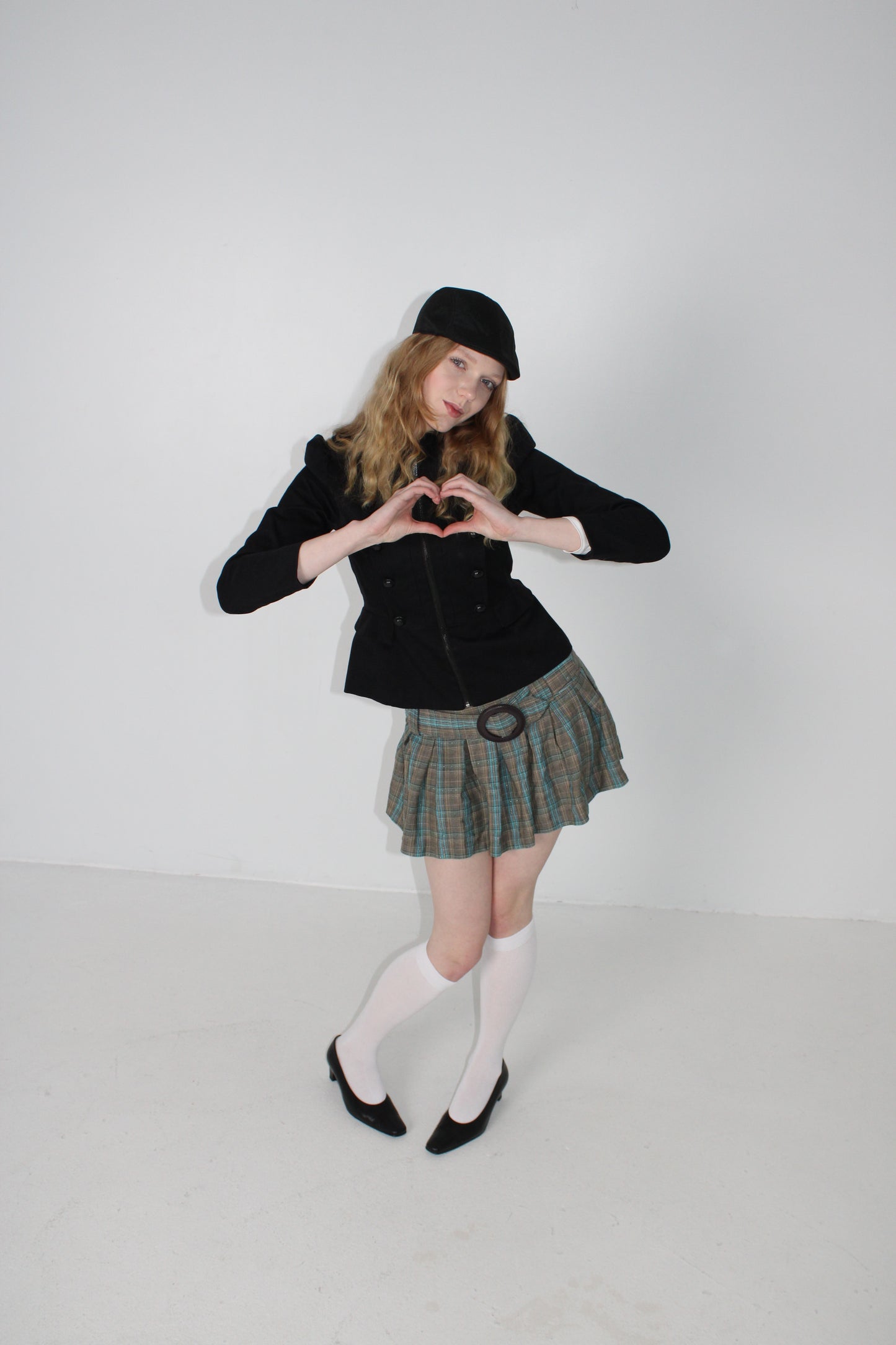 CHECKERED MINI SKIRT WITH A BUCKLE