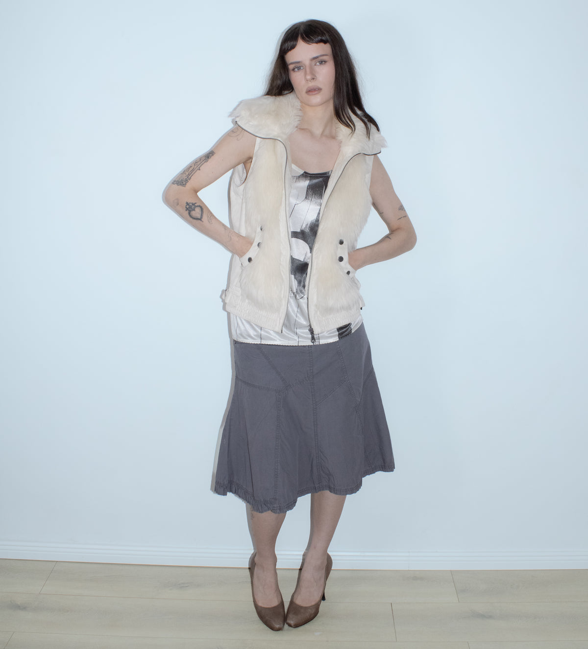 white faux fur vest