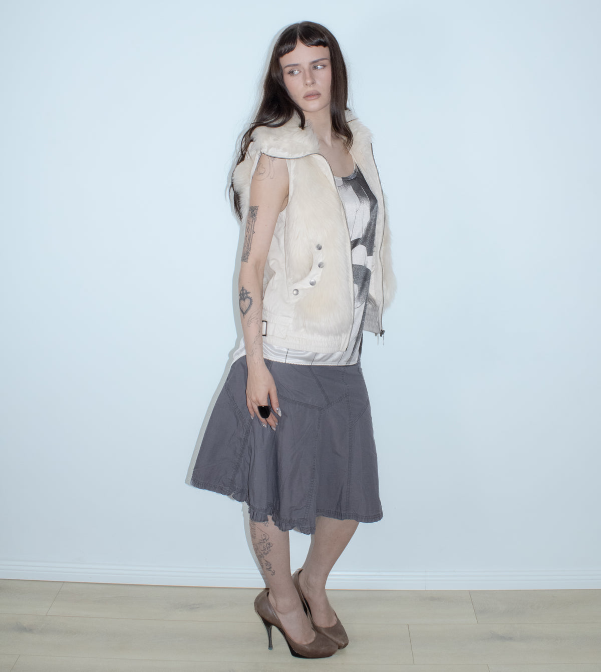 white faux fur vest