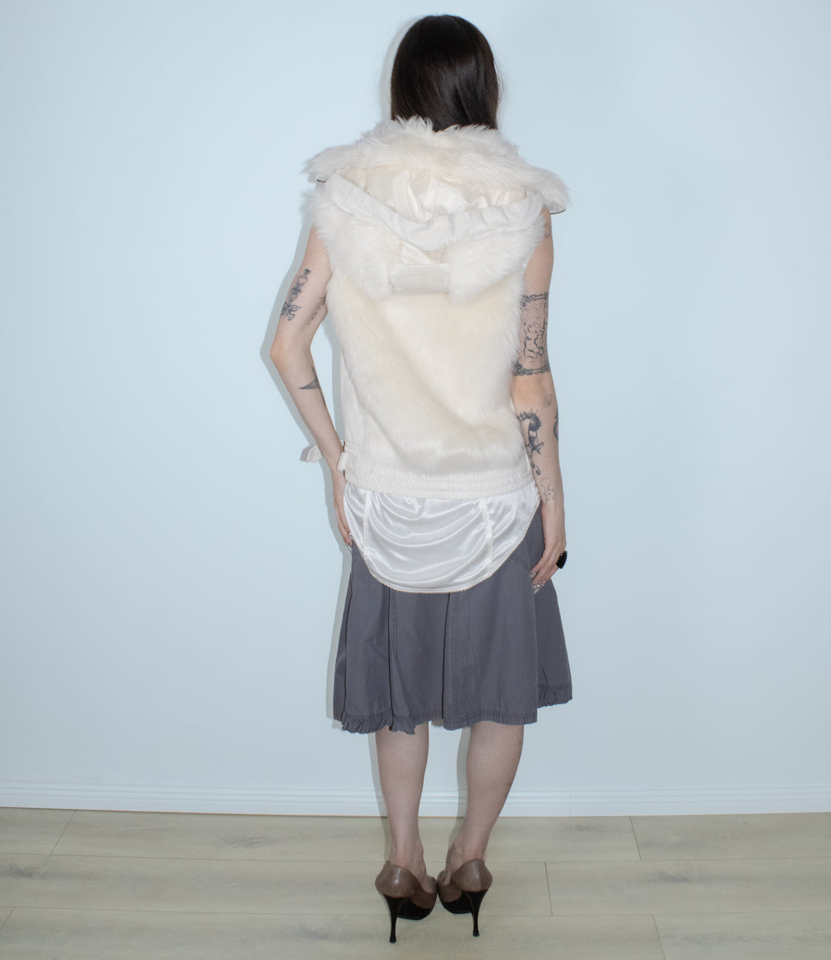 white faux fur vest