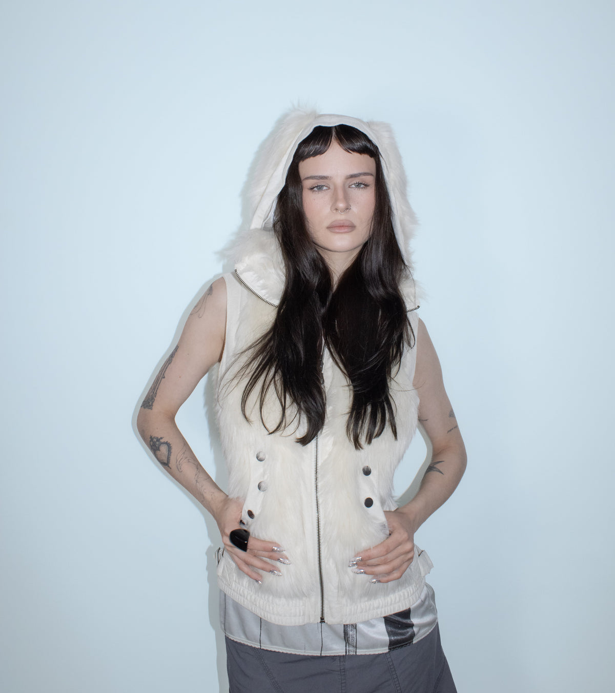 white faux fur vest