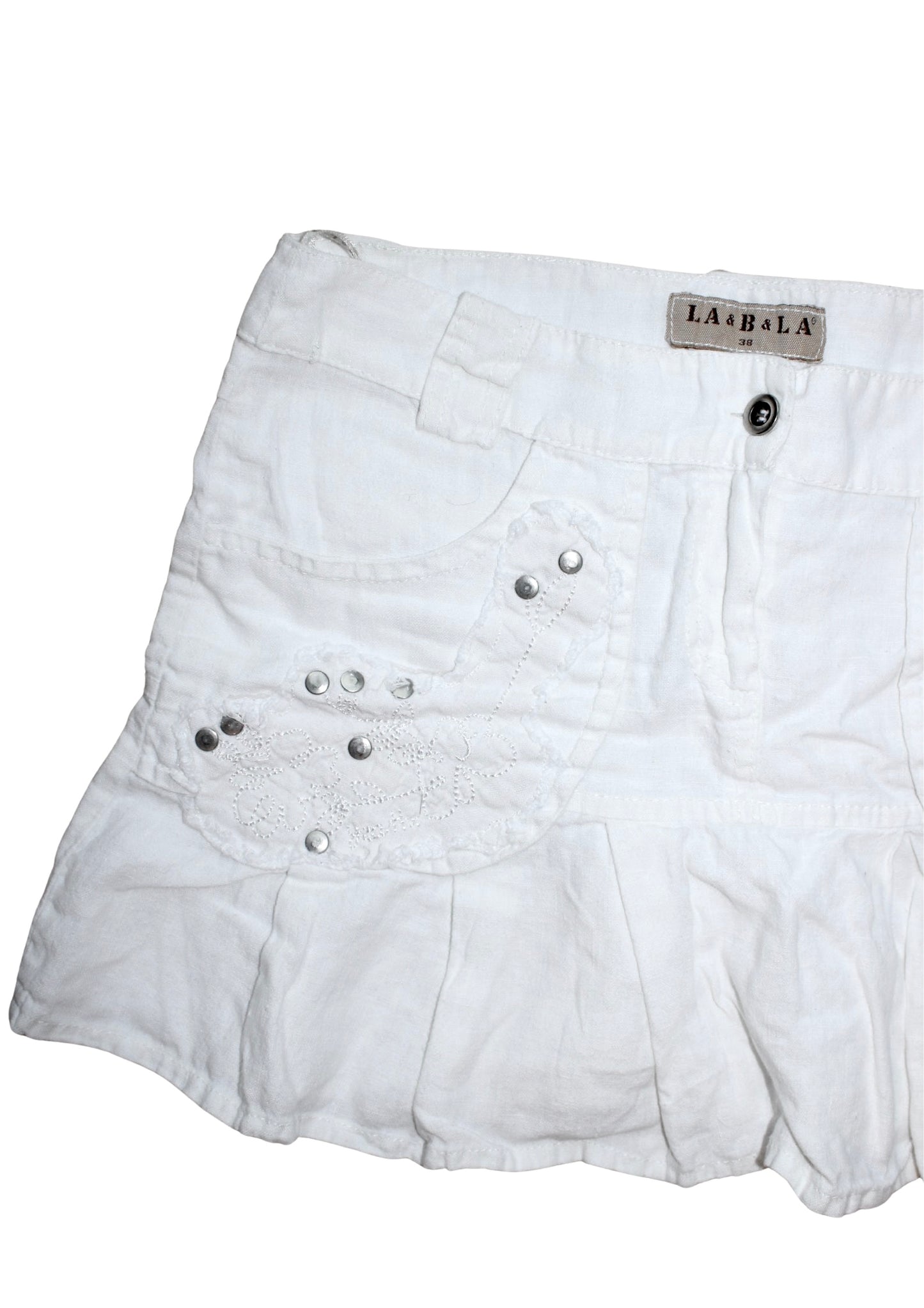 WHITE LOW RISE STUDDED MINI SKIRT