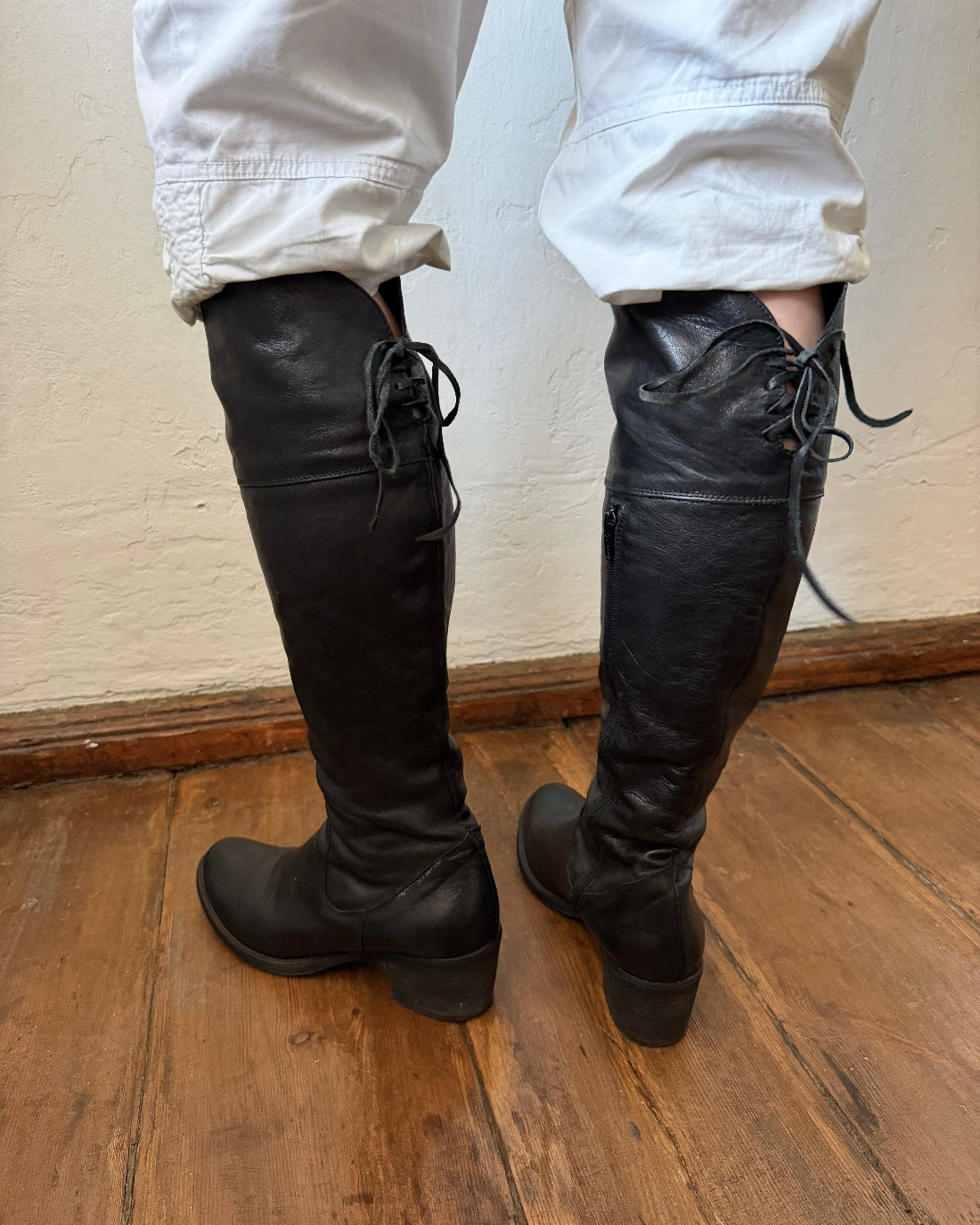 Vintage black leather lace-up boots with rounded toe