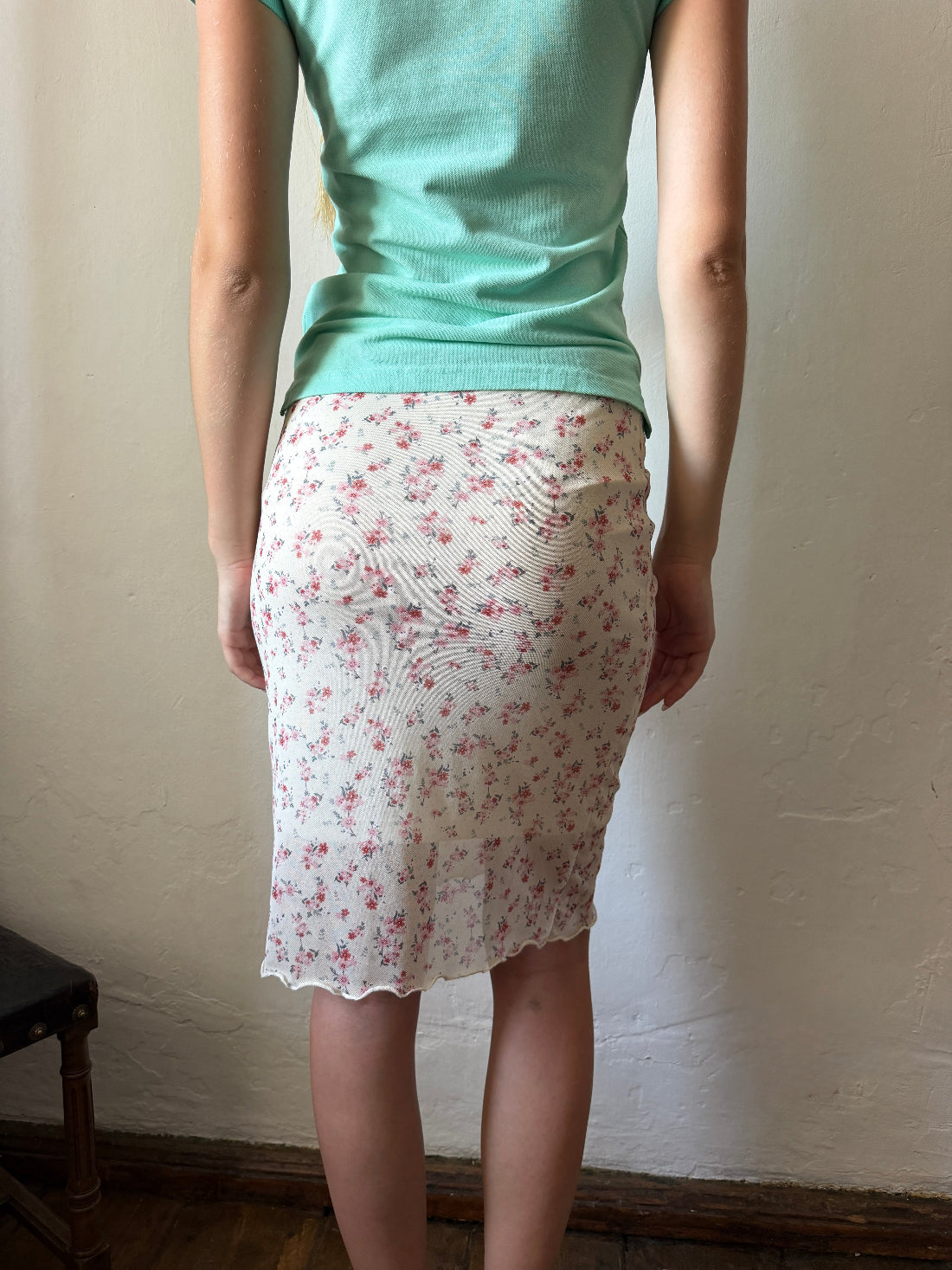 Floral mesh midi skirt with pink ditsy print and lettuce hem