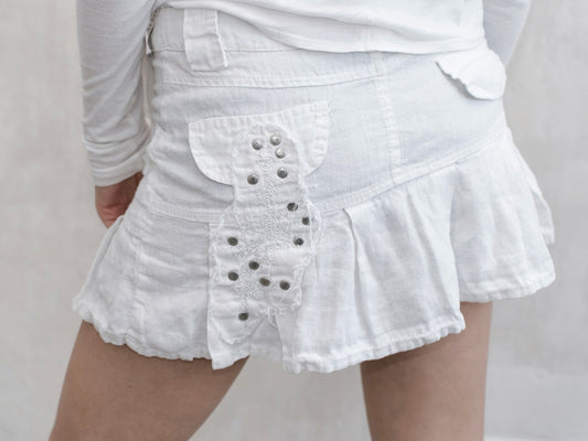 WHITE LOW RISE STUDDED MINI SKIRT